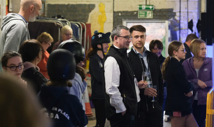 A photo showing business owners at the corporate network event
